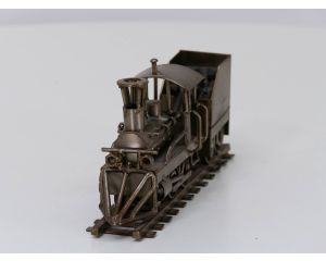 Metalen locomotief met sleeptender, lengte 25 cm. breedte 7 cm en hoogte 12 cm #3705