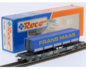 Schaal H0 Roco 46360 Taschenwagen met Frans Maas trailer van de NS #9697