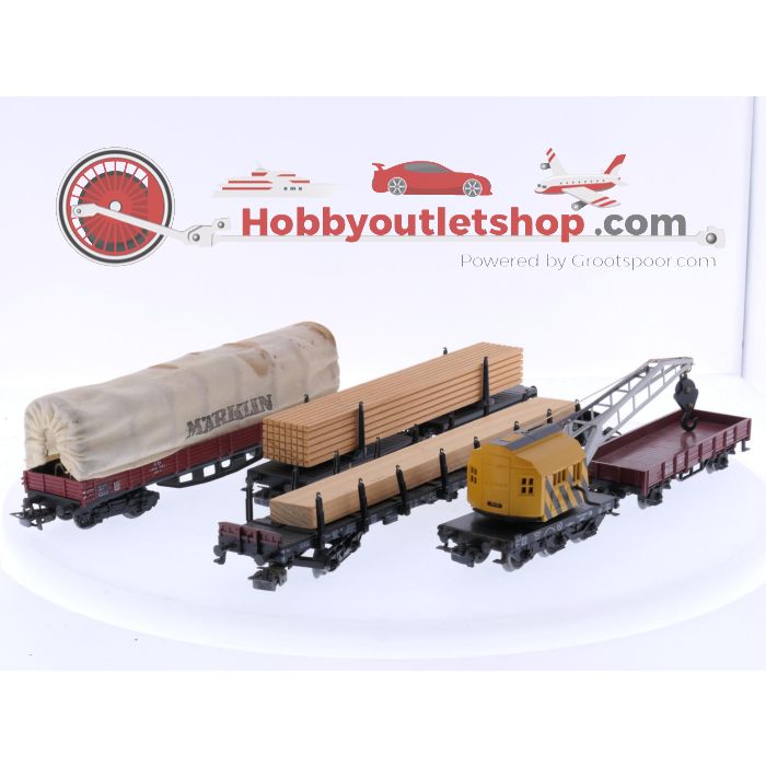 Schaal H0 Märklin 4475, 4512, 4663 en 4671 set van 4 goederenwagens en een kraanwagen van de DB #8104