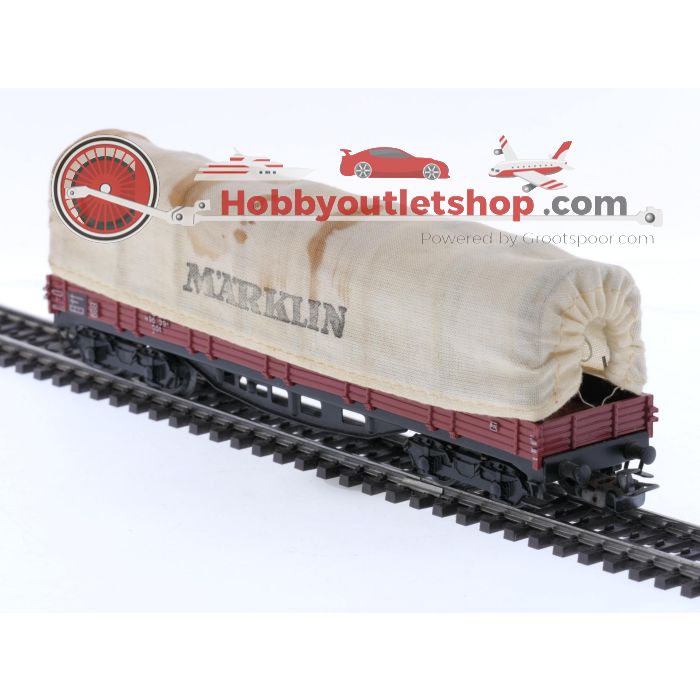 Schaal H0 Märklin 4475, 4512, 4663 en 4671 set van 4 goederenwagens en een kraanwagen van de DB #8104