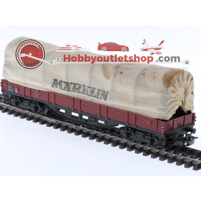 Schaal H0 Märklin 4475, 4512, 4663 en 4671 set van 4 goederenwagens en een kraanwagen van de DB #8104