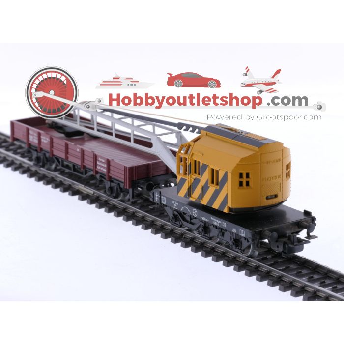 Schaal H0 Märklin 4475, 4512, 4663 en 4671 set van 4 goederenwagens en een kraanwagen van de DB #8104