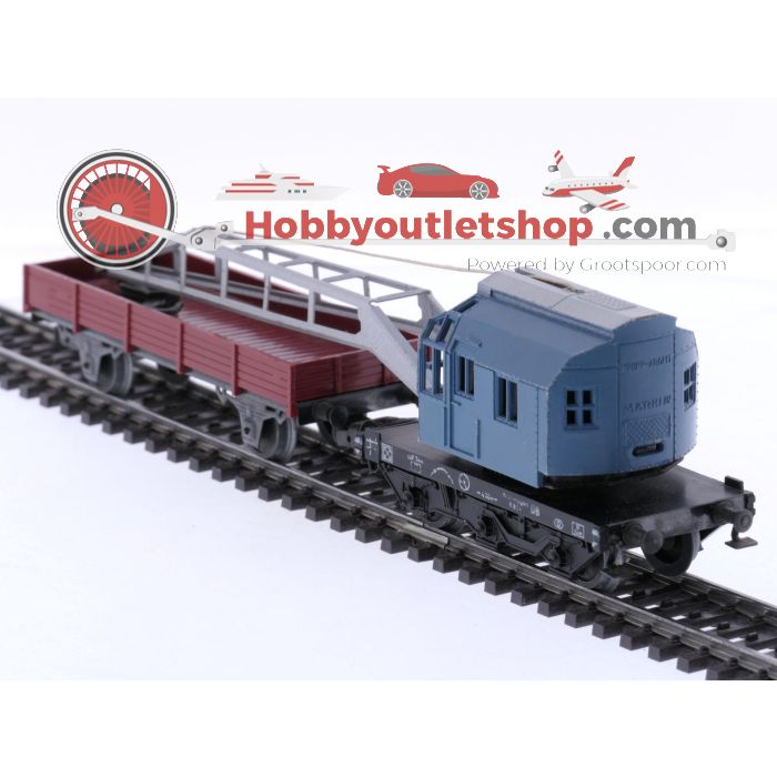 Schaal H0 Märklin 4502, 4610, 4611 en 4635 set van 3 goederenwagens en een kraanwagen met bij wagen van de DB #8105