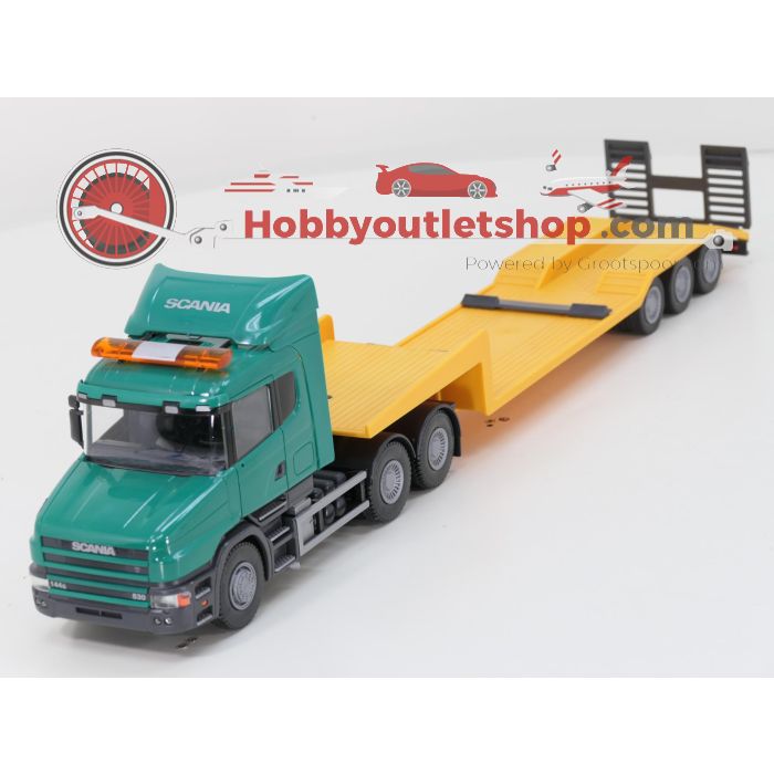 EMEK Groene scania 144G 530 met gele oplegger