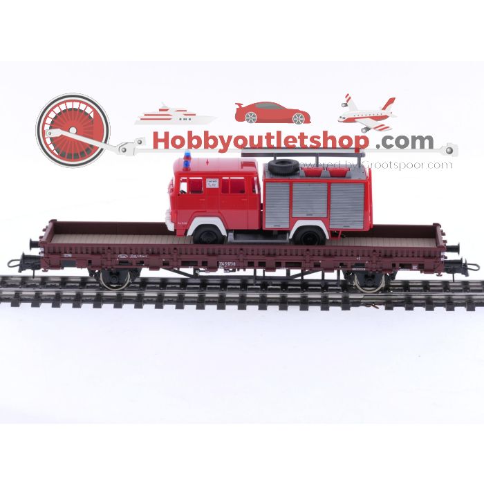 Schaal H0 Roco 66789 rongenwagon met brandweerwagen als lading van de DB #5707