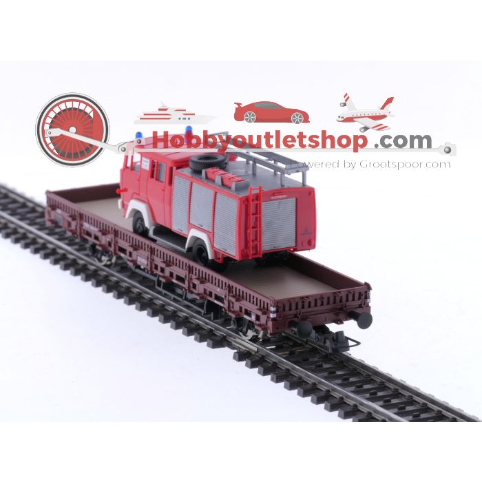 Schaal H0 Roco 66789 rongenwagon met brandweerwagen als lading van de DB #5707