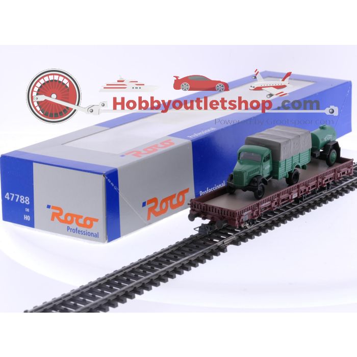 Schaal H0 Roco 47788 rongenwagon met vrachtwagen als lading van de DB #5708