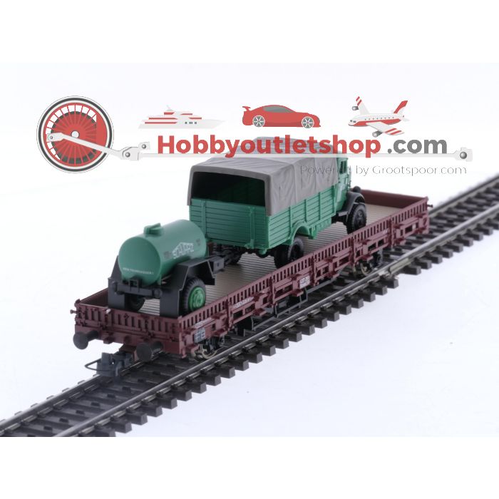 Schaal H0 Roco 47788 rongenwagon met vrachtwagen als lading van de DB #5708