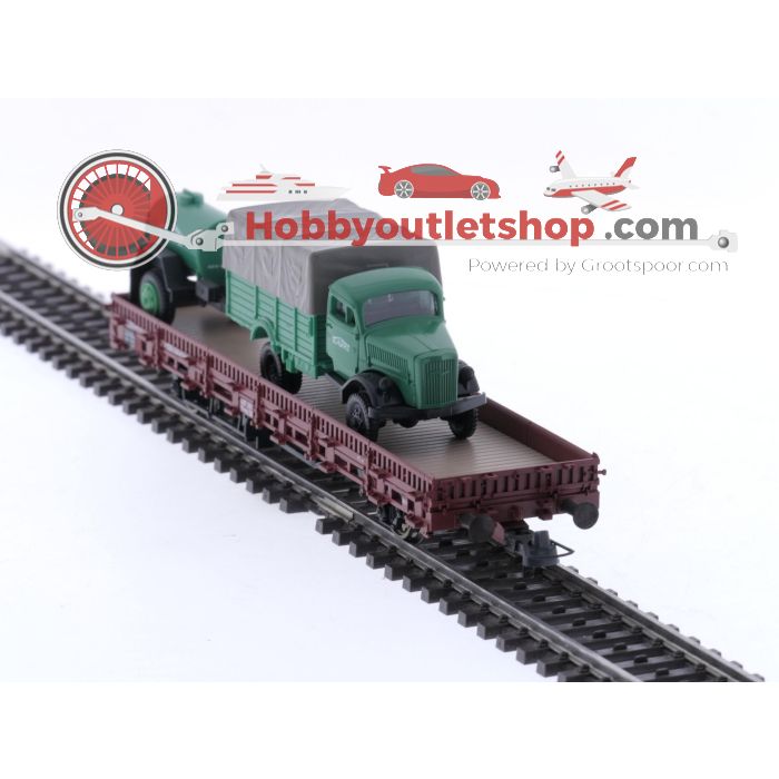 Schaal H0 Roco 47788 rongenwagon met vrachtwagen als lading van de DB #5708