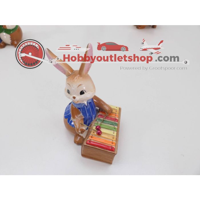 12 x Goebel figuren beeldjes: Mijn grote dag, paaskoor, doedelzak, saxofonist, vioolduet, drummer, gitaar, contrabas, lier, xylofoon. Paasdrummer en triangel #4605 - sku: 20230713031112 - Gebruikt - Goede staat - Afbeelding 3