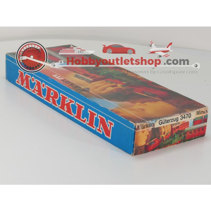 Schaal 0e Märklin 3470 kiepwagon met 13-delige bochten van de WEG #5925